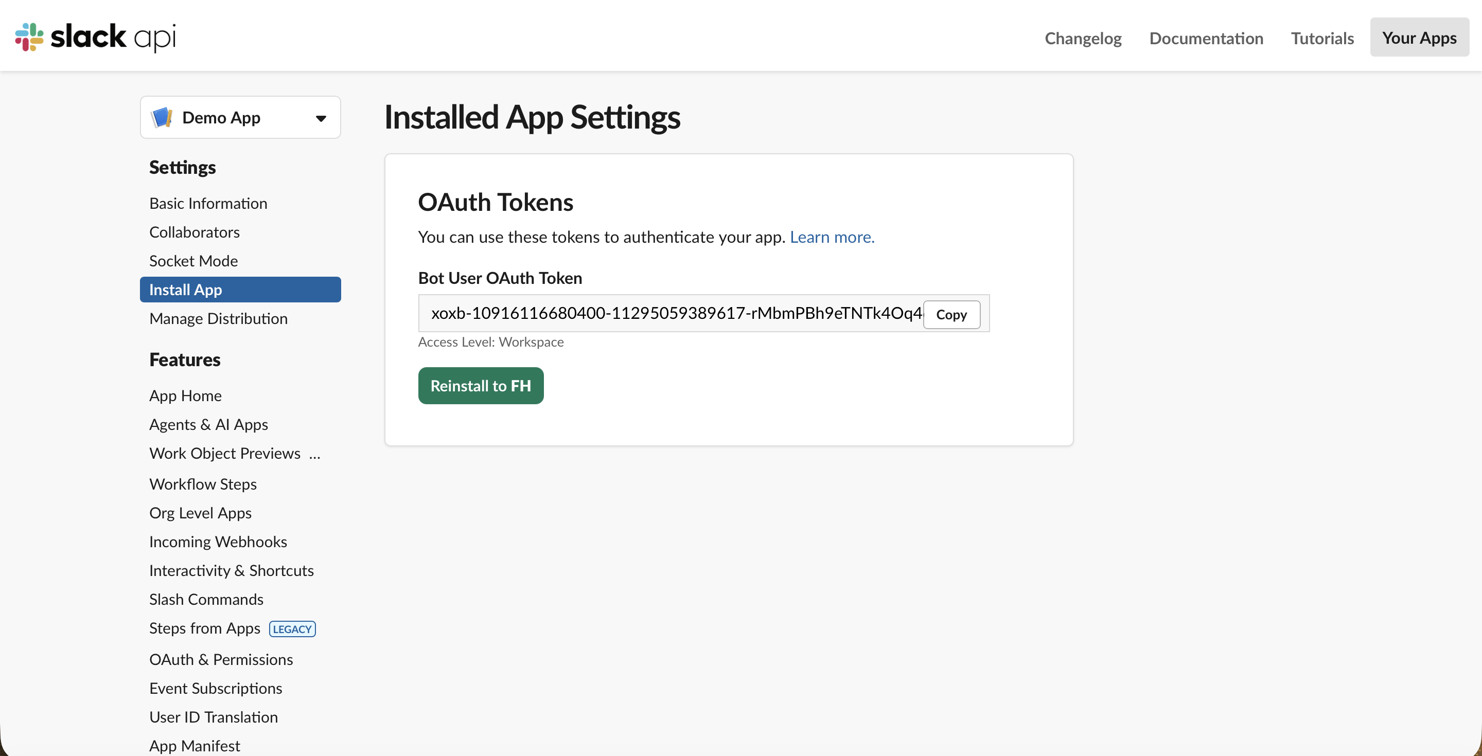 Slack Installed App Settings showing the Bot User OAuth Token starting with xoxb